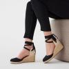Anne Klein Women’s Zia Wedge Sandal(Black)